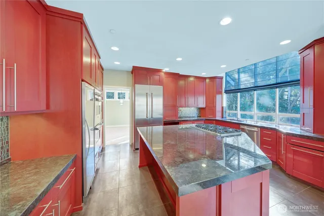 a dining room with large window