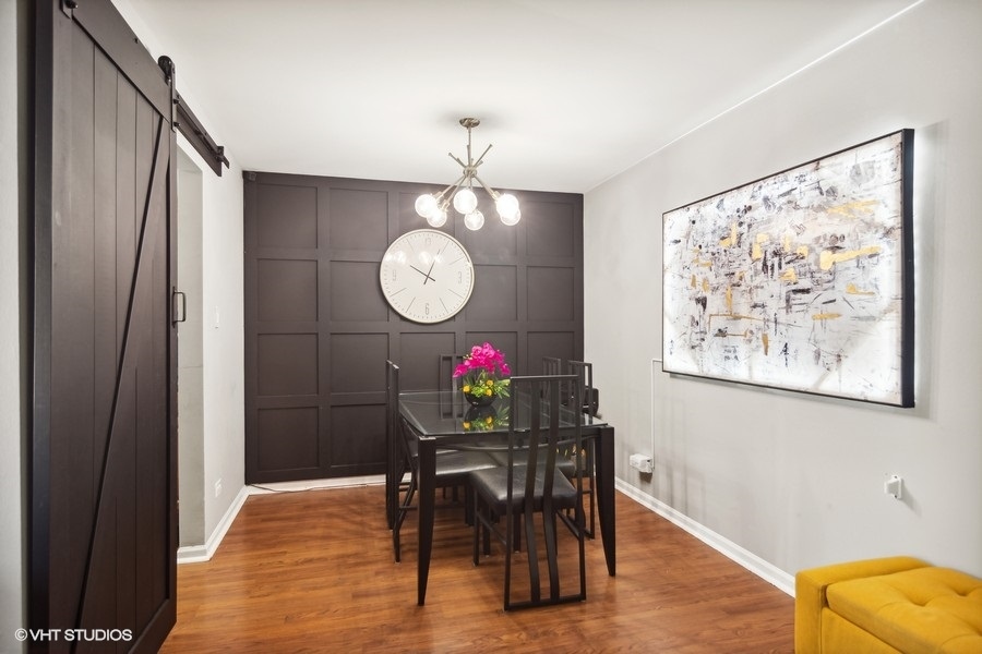 1345 East Evergreen Drive, Unit 3 Palatine, IL 60074 - Photo 4 of 13 a view of a dining room with furniture and wooden floor