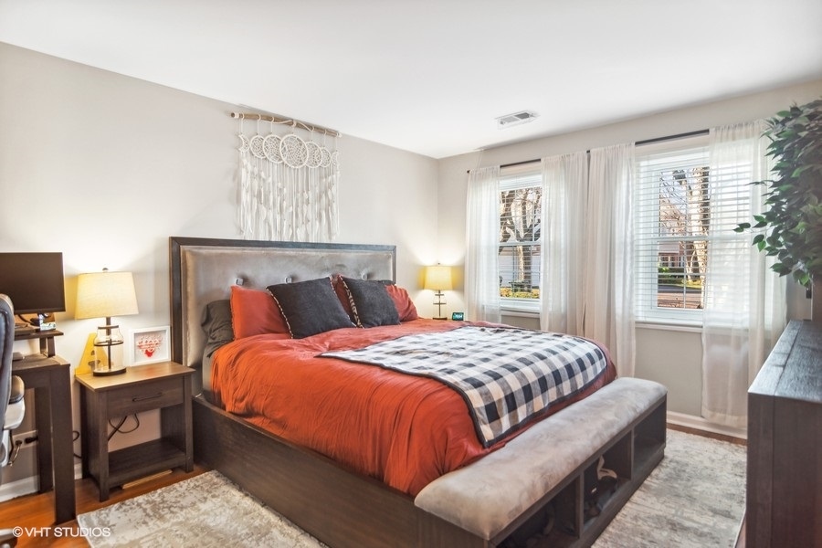 1345 East Evergreen Drive, Unit 3 Palatine, IL 60074 - Photo 8 of 13 a bedroom with bed and window