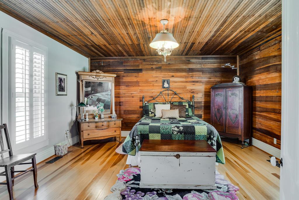 951 Gunter Ridge Road Pulaski, TN 38478 - Photo 16 of 25 Downstairs bedroom with stained bead board
