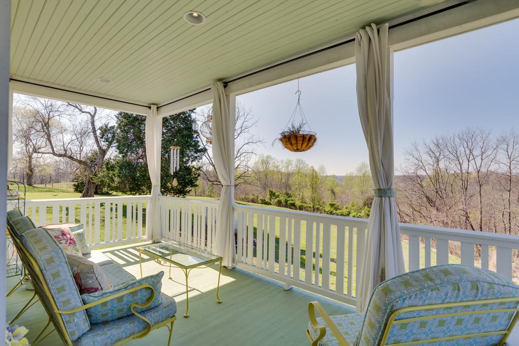 951 Gunter Ridge Road Pulaski, TN 38478 - Photo 22 of 25 Enjoy your afternoons & evening sunsets on this fabulous covered porch.