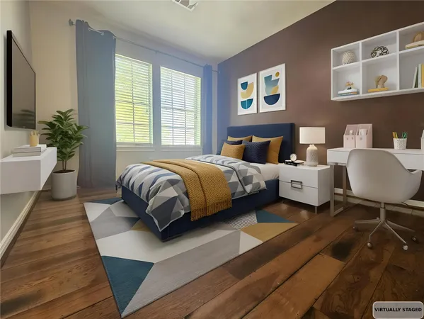 a bedroom with double bed and a window