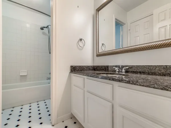 a bathroom with a sink and a bathtub