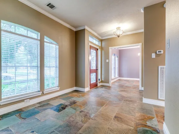 a view of a room with a large windows