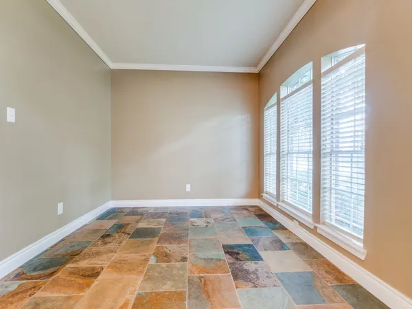 a view of an empty room and window