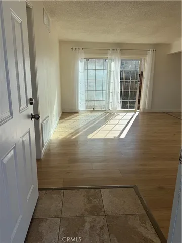 a view of a house with a fence