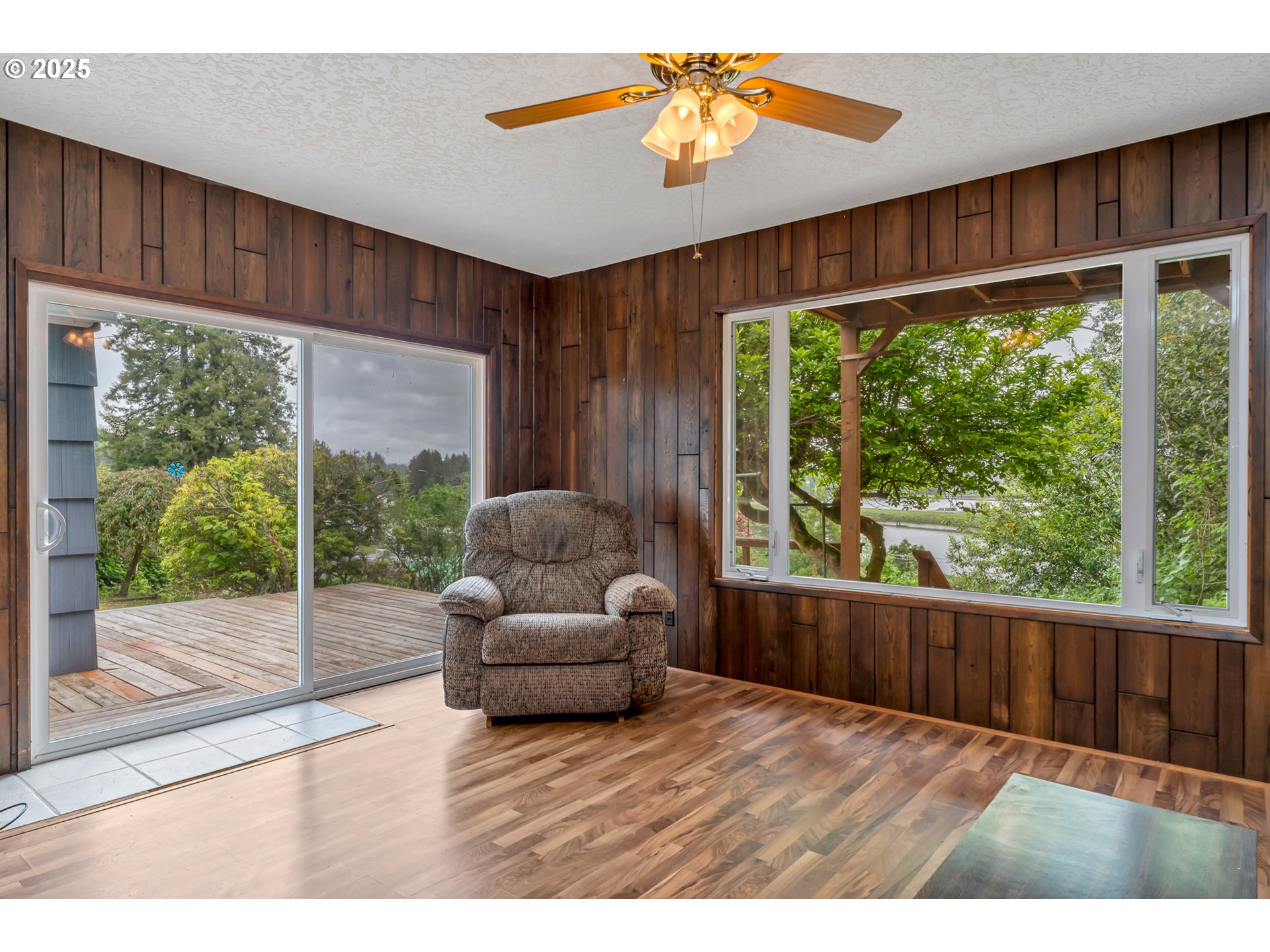 13005 I Street Nehalem, OR 97131 - Photo 12 of 45 a living room with furniture and a window