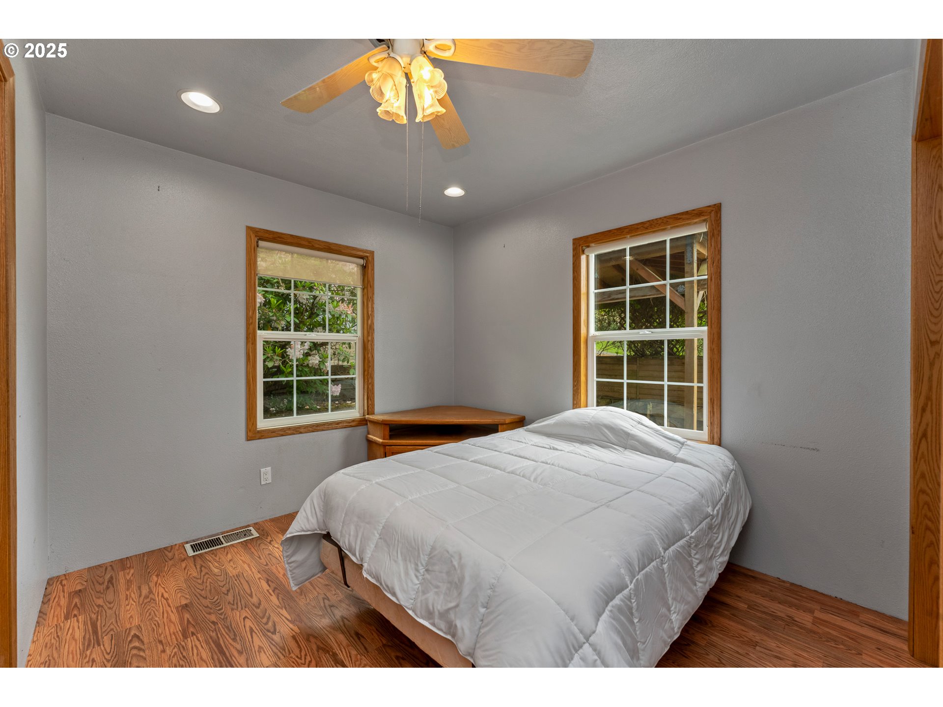13005 I Street Nehalem, OR 97131 - Photo 20 of 45 a bedroom with a bed and a window