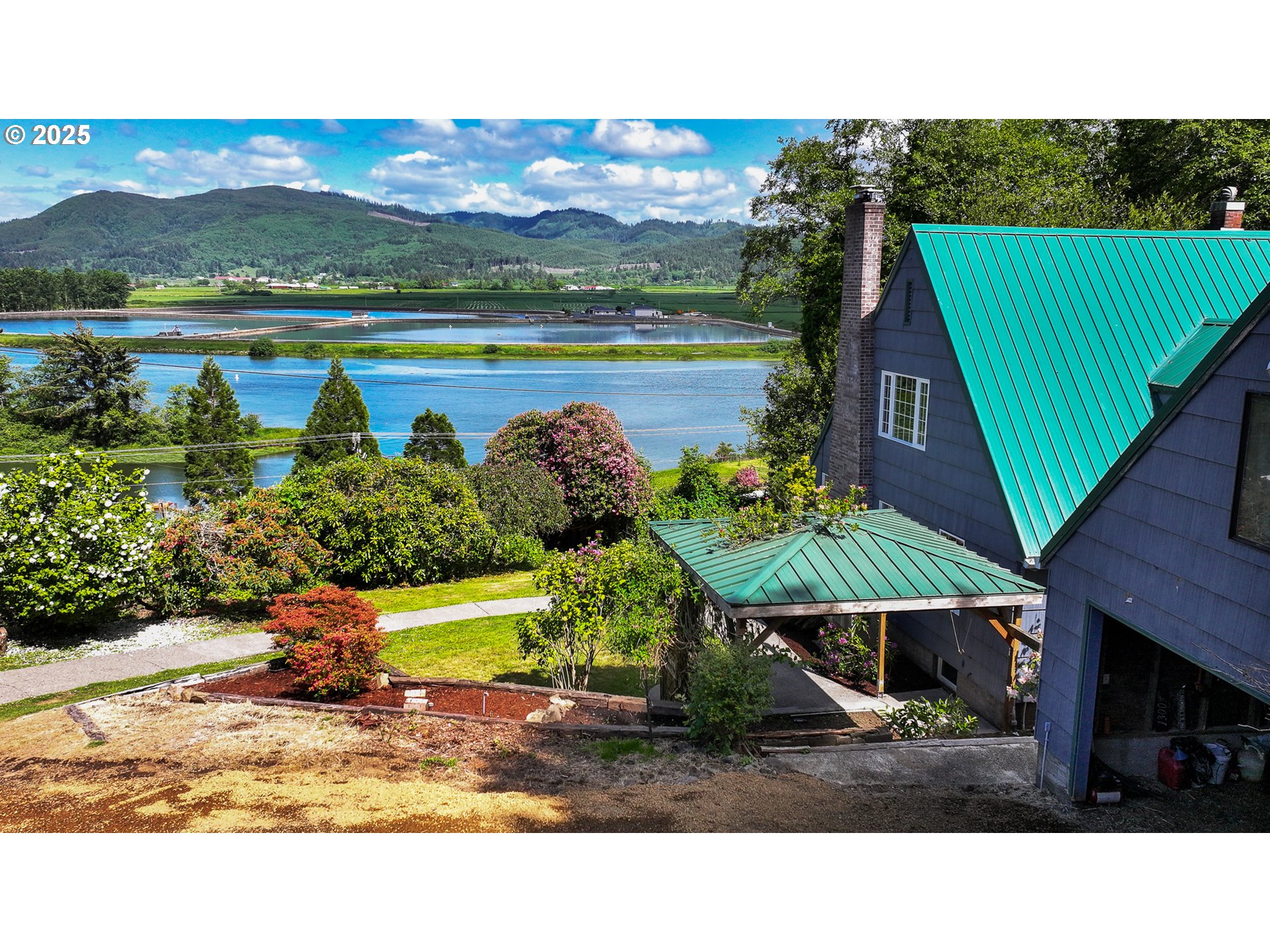 13005 I Street Nehalem, OR 97131 - Photo 2 of 45 a view of swimming pool with a balcony