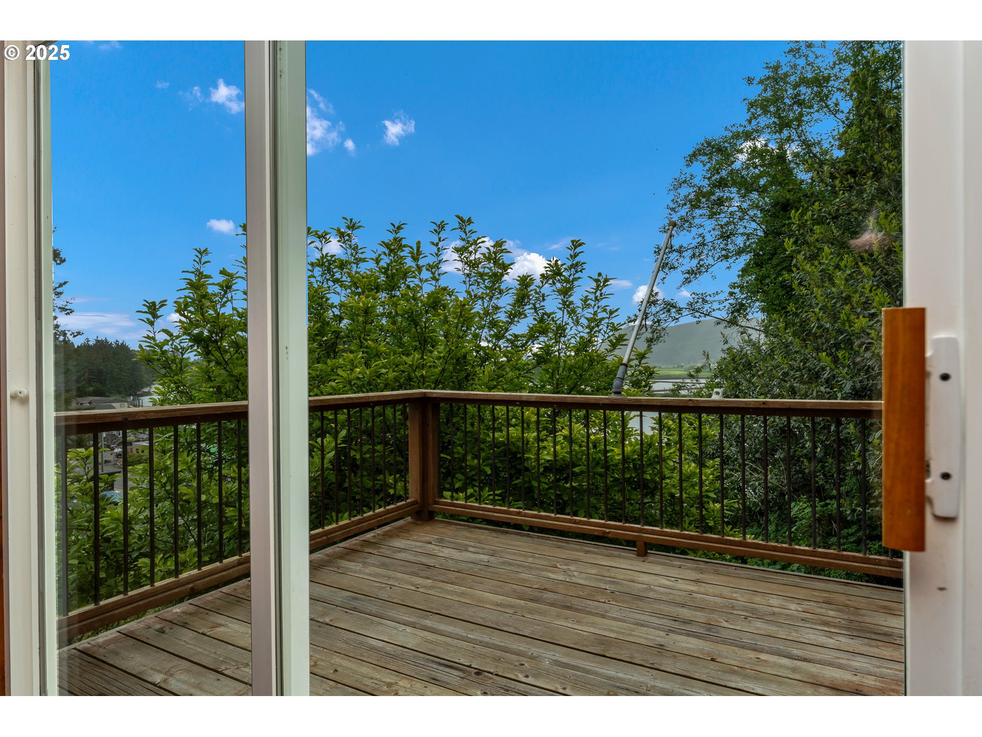 13005 I Street Nehalem, OR 97131 - Photo 28 of 45 a view of balcony with wooden floor