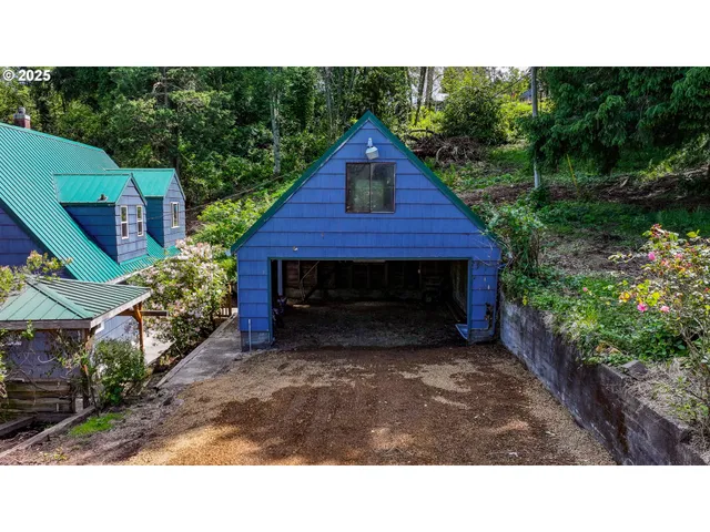 a view of house with backyard and entertaining space