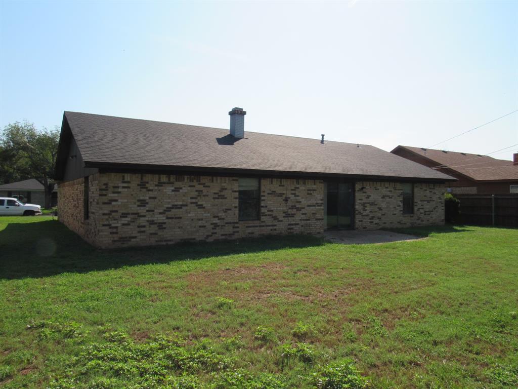 2008 Dan Rowe Street Waco, TX 76704 - Photo 13 of 13 a front view of a house with a garden