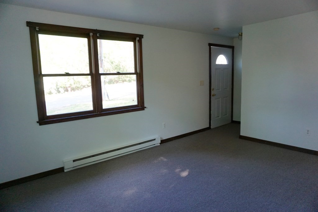 42 Pine Street Warren, MA 01083 - Photo 3 of 12 an empty room with a window