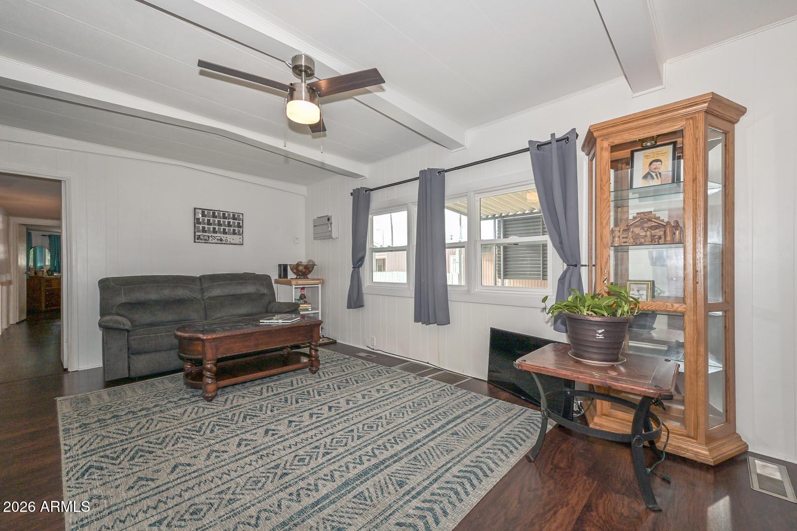 16225 North Cave Creek Road, Unit 79 Phoenix, AZ 85032 - Photo 6 of 32 a living room with furniture and a window