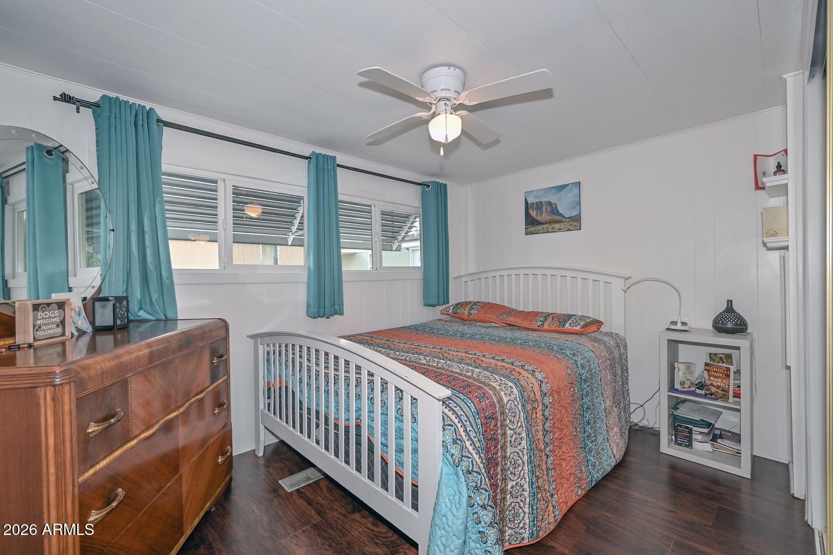 16225 North Cave Creek Road, Unit 79 Phoenix, AZ 85032 - Photo 9 of 32 a bedroom with a bed and a window