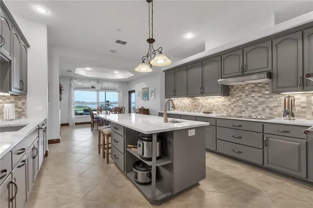 a view of a garage with a table and chairs