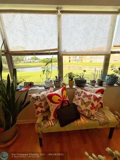 a view of a living room with furniture