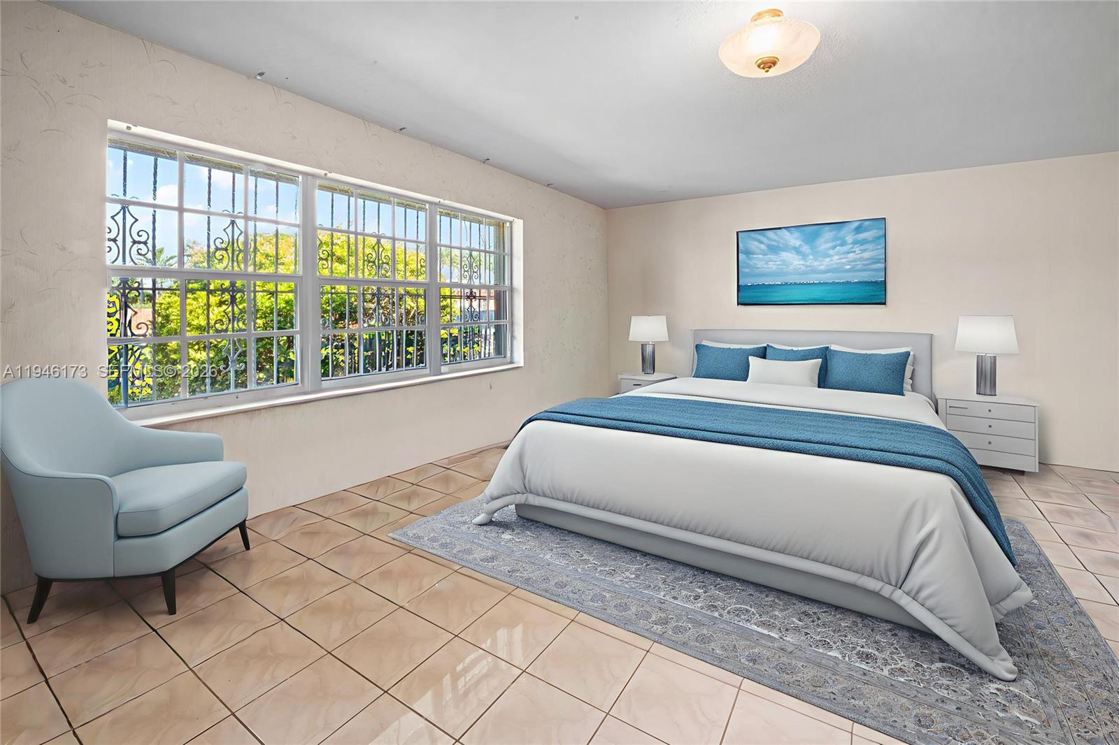 9730 Southwest 44th Street Miami, FL 33165 - Photo 13 of 53 a bedroom with a bed and a couch