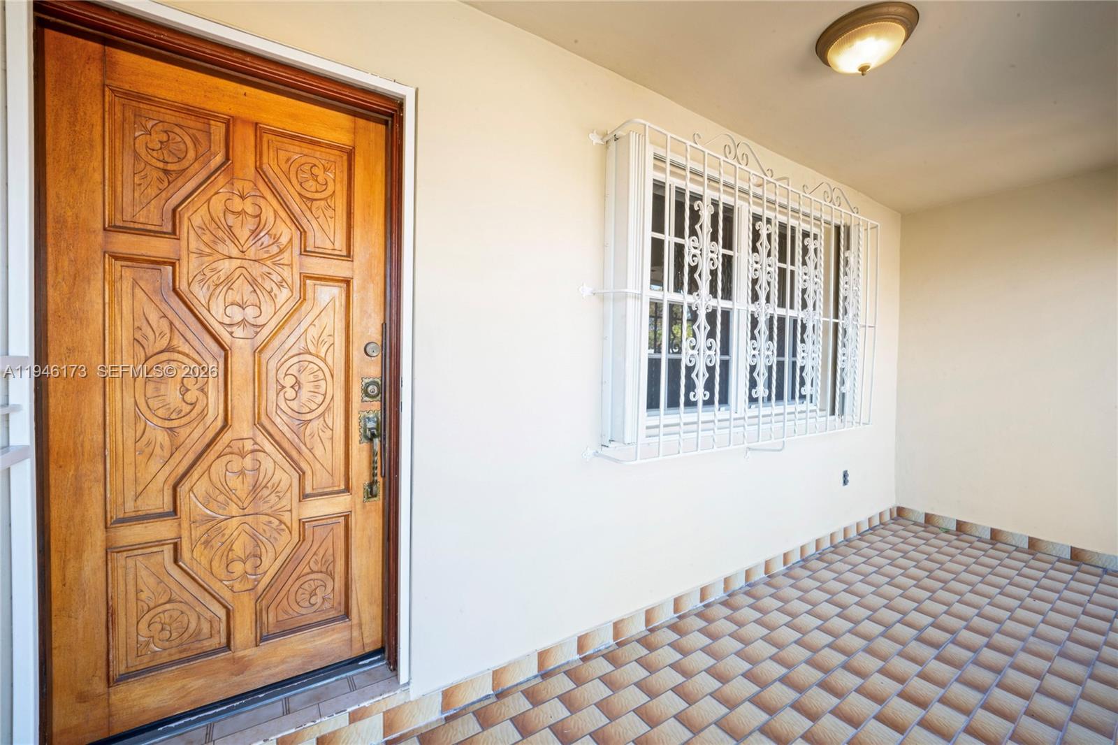 9730 Southwest 44th Street Miami, FL 33165 - Photo 3 of 53 a view of front door
