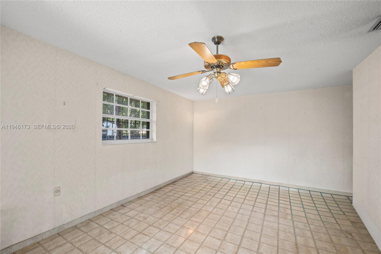 9730 Southwest 44th Street Miami, FL 33165 - Photo 33 of 53 wooden floor in an empty room