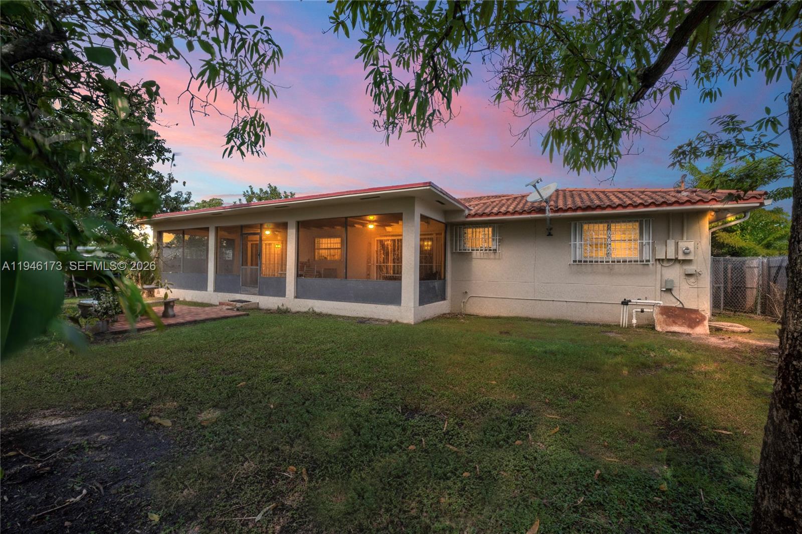 9730 Southwest 44th Street Miami, FL 33165 - Photo 39 of 53 a front view of a house with garden