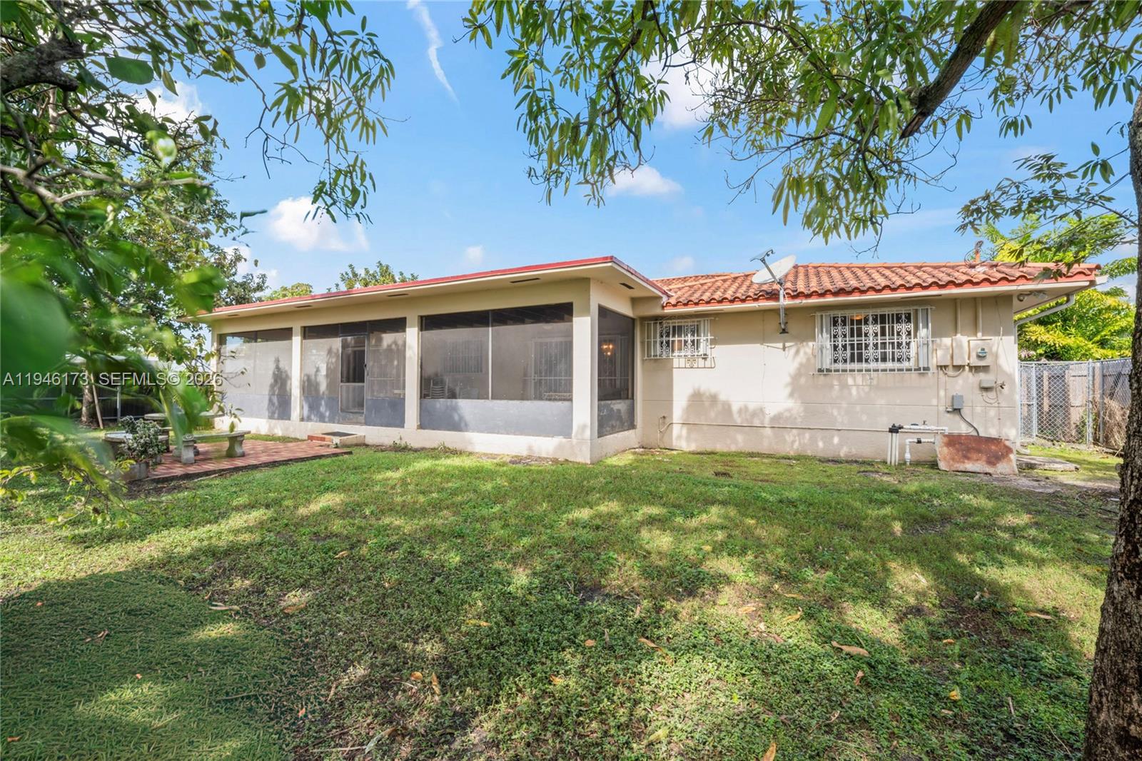 9730 Southwest 44th Street Miami, FL 33165 - Photo 40 of 53 a view of a house with a backyard