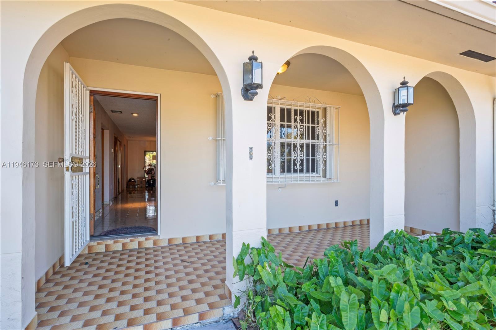 9730 Southwest 44th Street Miami, FL 33165 - Photo 46 of 53 a view of a brick house with large windows