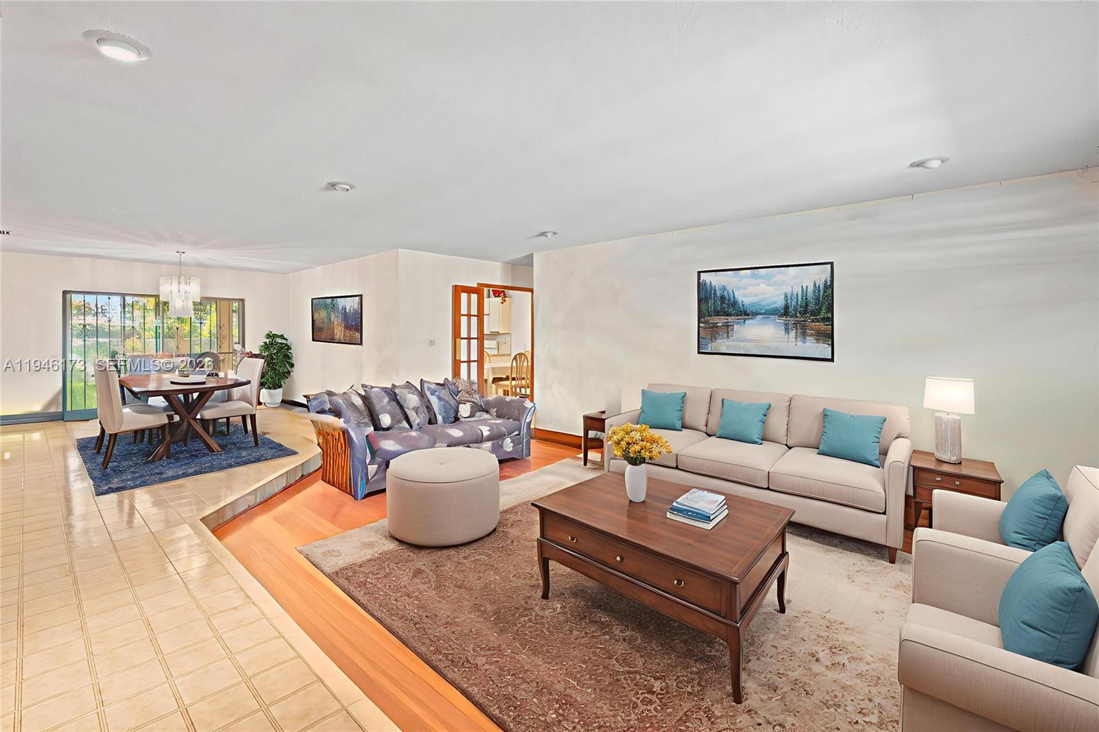 9730 Southwest 44th Street Miami, FL 33165 - Photo 5 of 53 a living room with furniture and a rug