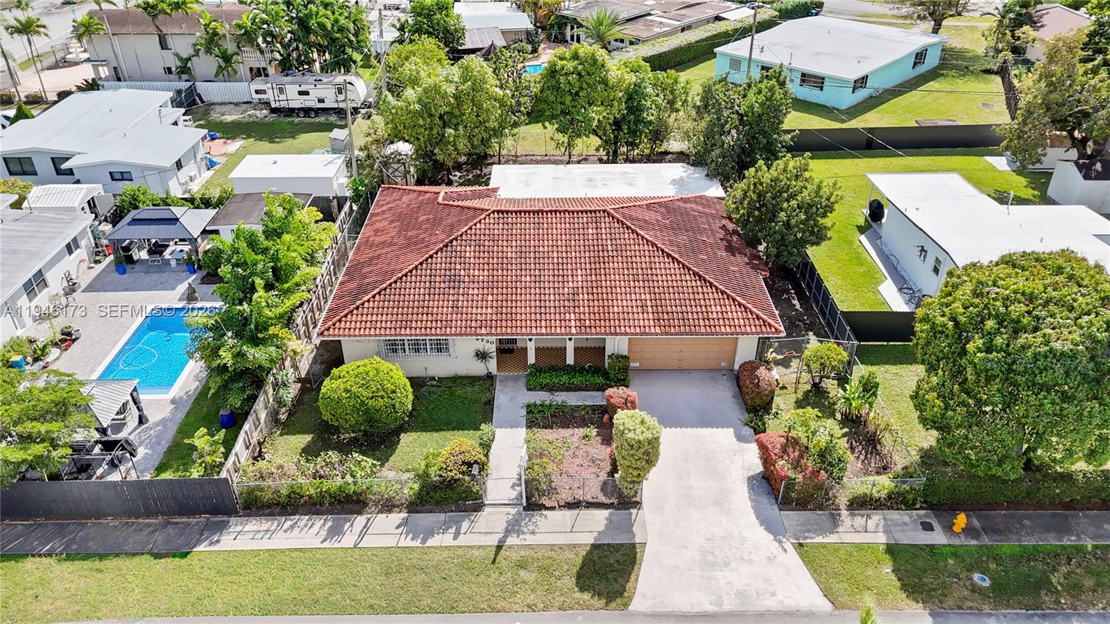 9730 Southwest 44th Street Miami, FL 33165 - Photo 52 of 53 a aerial view of a house with garden