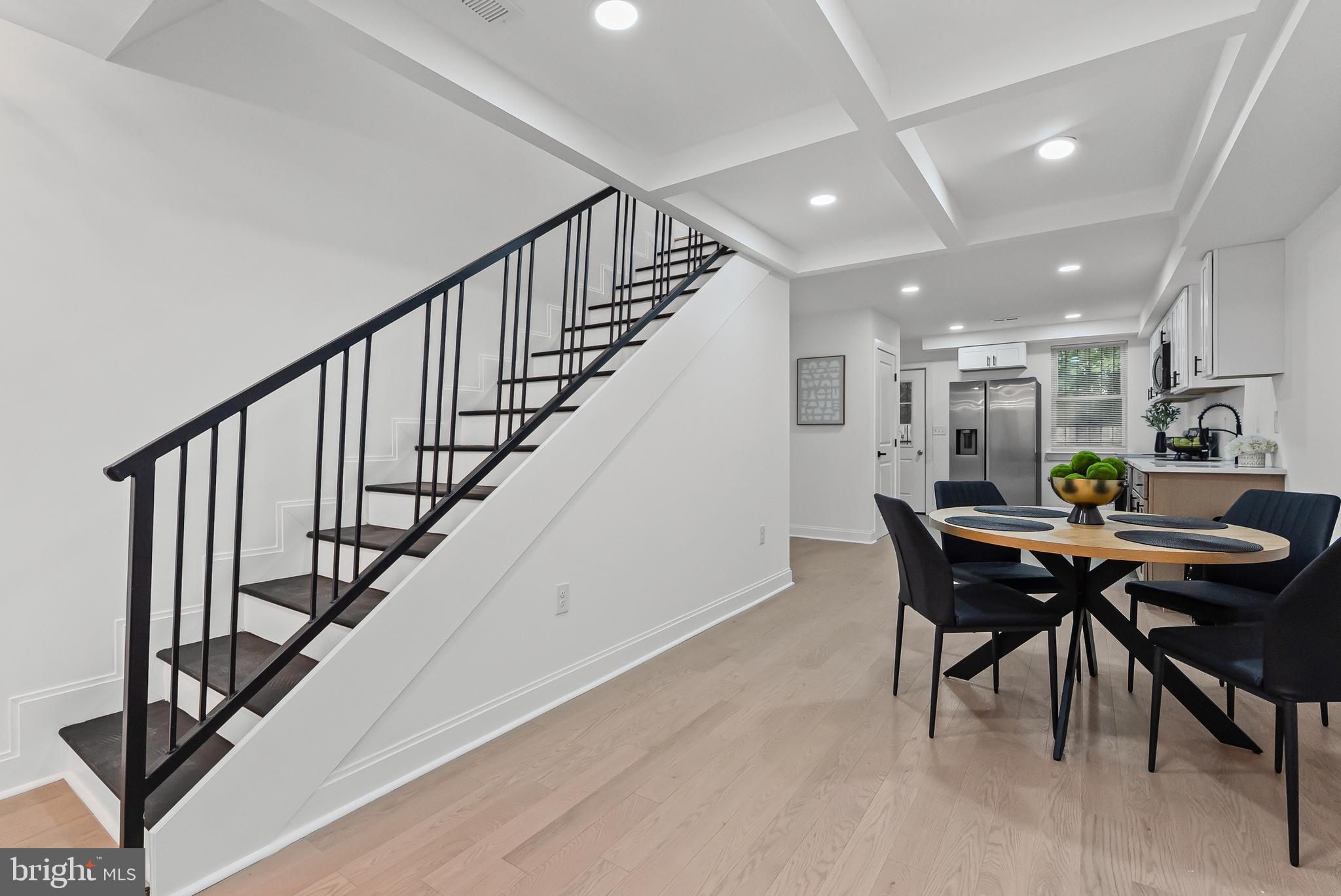 2430 East Biddle Street Baltimore, MD 21213 - Photo 6 of 26 a view of a dining room with furniture
