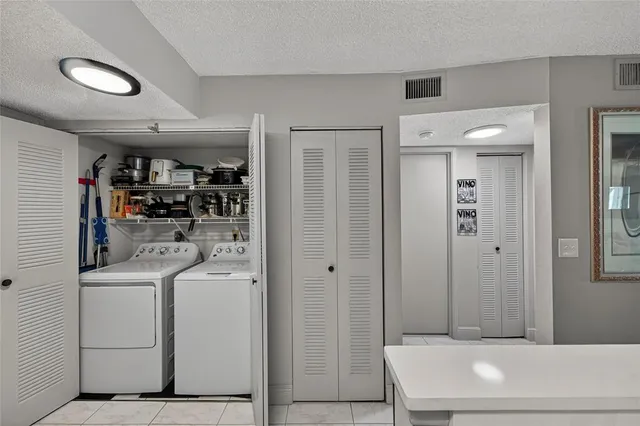 a view of a brick building with many windows