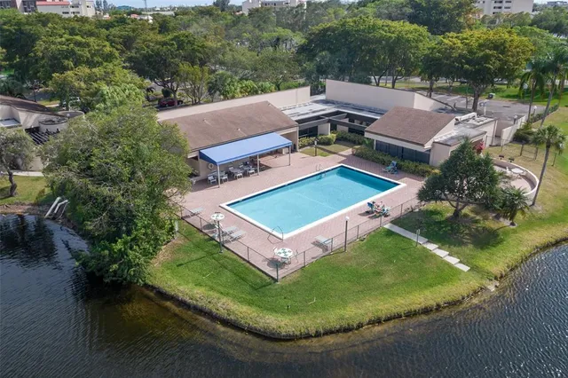a view of swimming pool from a balcony