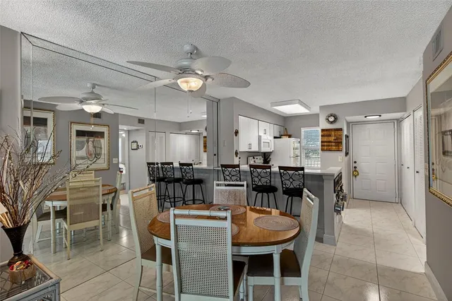 a bedroom with a large bed and a large window