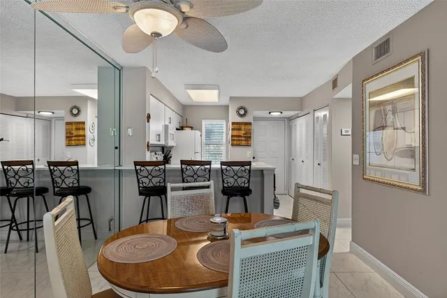 a bedroom with a large bed and a flat screen tv