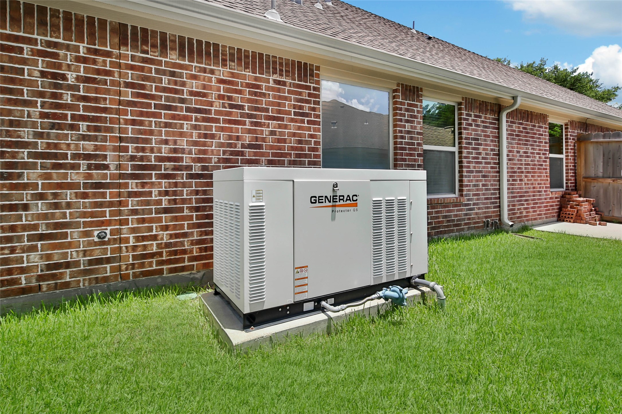 1215 Jake Springs Court Spring, TX 77386 - Photo 36 of 49 The Generac whole home generator means peace of mind to keep your home running during a power outage.