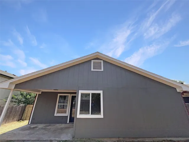 a front view of a house with windows