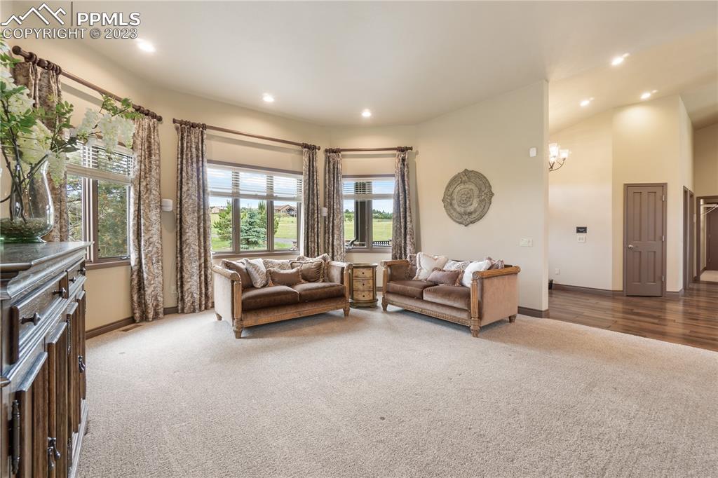 14525 Sterling Road Colorado Springs, CO 80921 - Photo 19 of 46 a living room with furniture and a large window