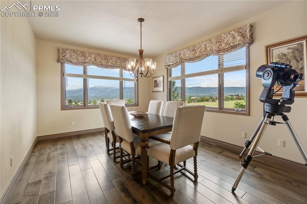 14525 Sterling Road Colorado Springs, CO 80921 - Photo 20 of 46 a view of a dining room with furniture window and outside view
