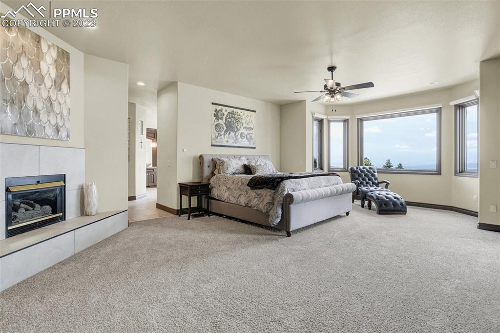 14525 Sterling Road Colorado Springs, CO 80921 - Photo 22 of 46 a living room with furniture and a fireplace