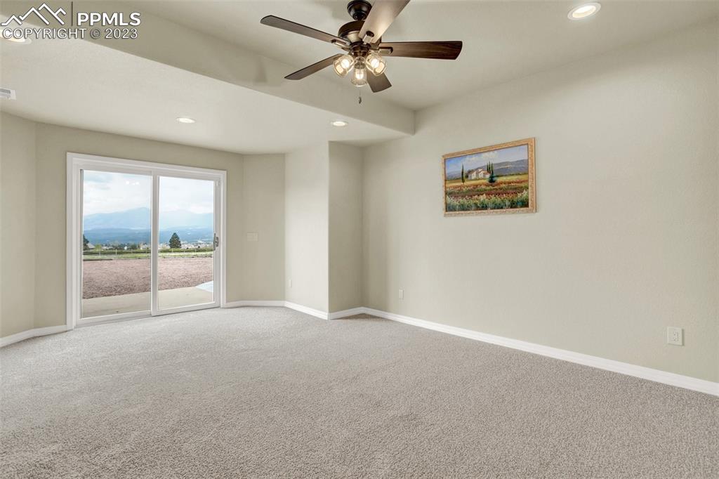 14525 Sterling Road Colorado Springs, CO 80921 - Photo 29 of 46 a view of an empty room with a window