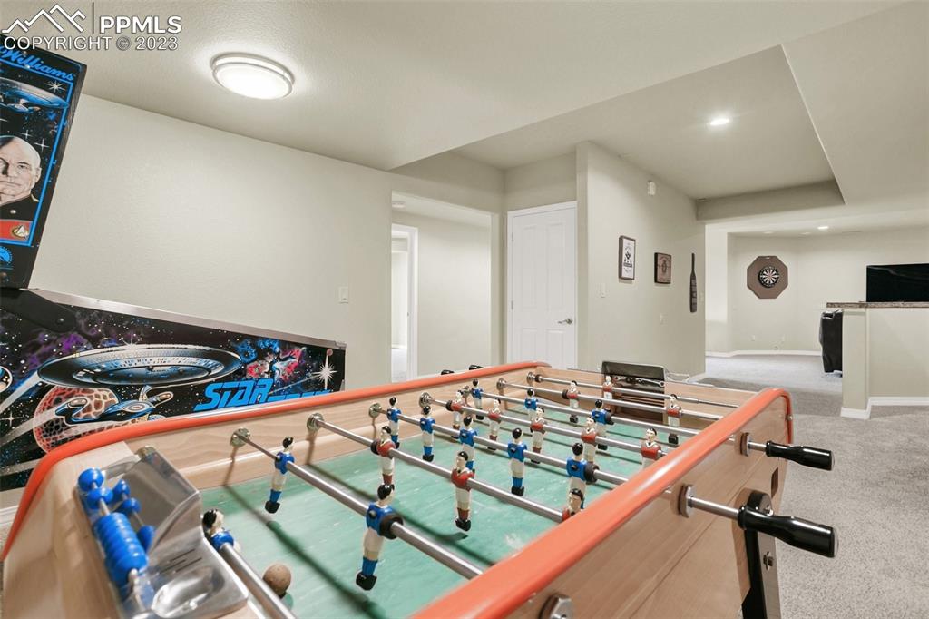 14525 Sterling Road Colorado Springs, CO 80921 - Photo 39 of 46 a bedroom with a bed and a flat screen tv