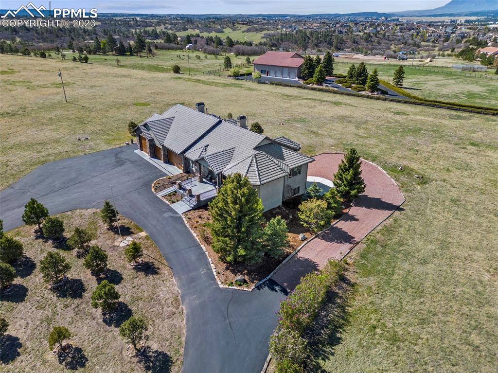 14525 Sterling Road Colorado Springs, CO 80921 - Photo 43 of 46 an aerial view of a house with a lake view
