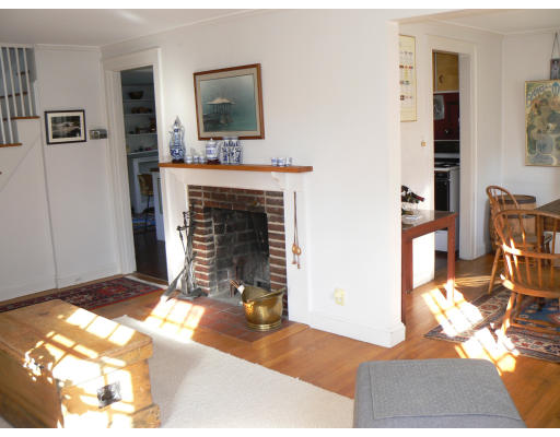 16 Manchester Road Newton, MA 02461 - Photo 3 of 7 a living room with furniture and a fireplace