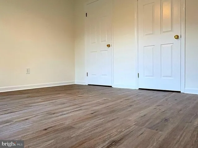 a view of small space with wooden floor