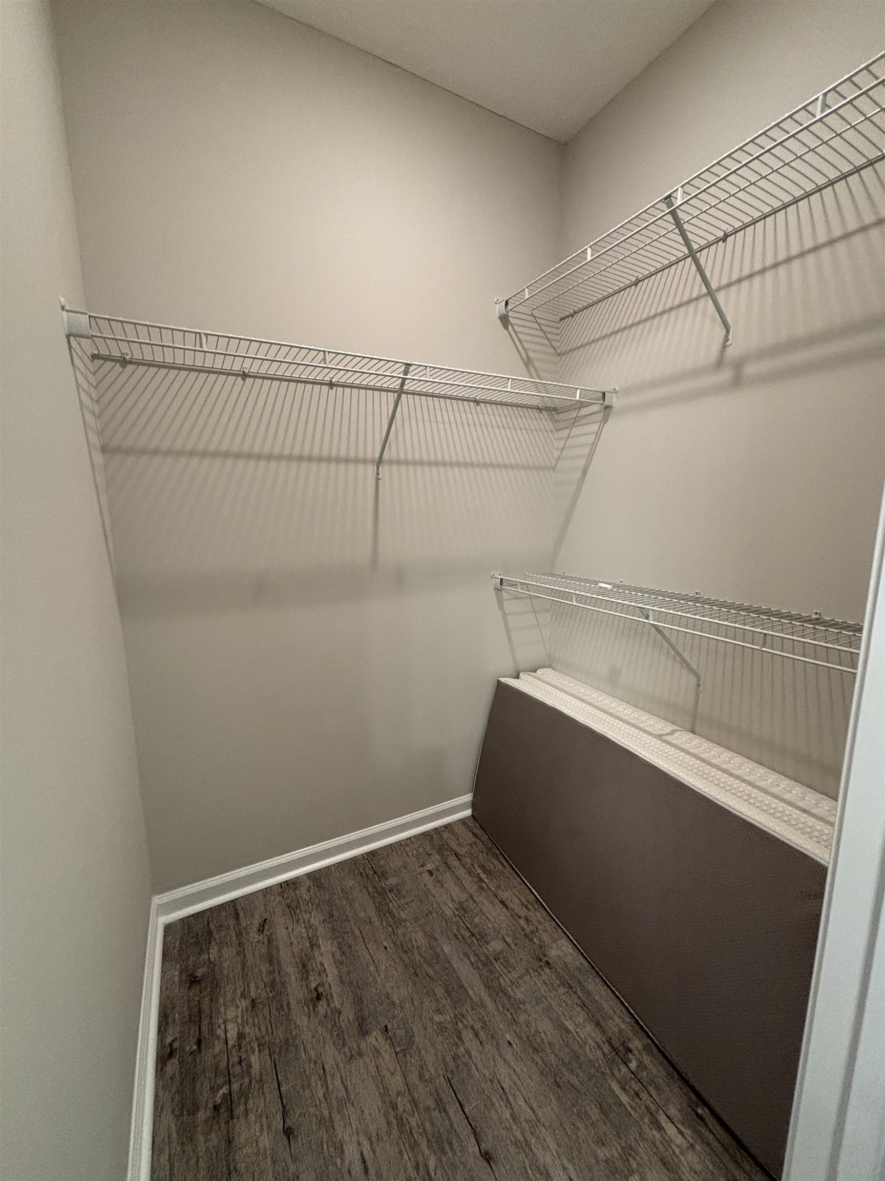 227 Leste Road Myrtle Beach, SC 29588 - Photo 14 of 33 Spacious closet with dark wood-type flooring