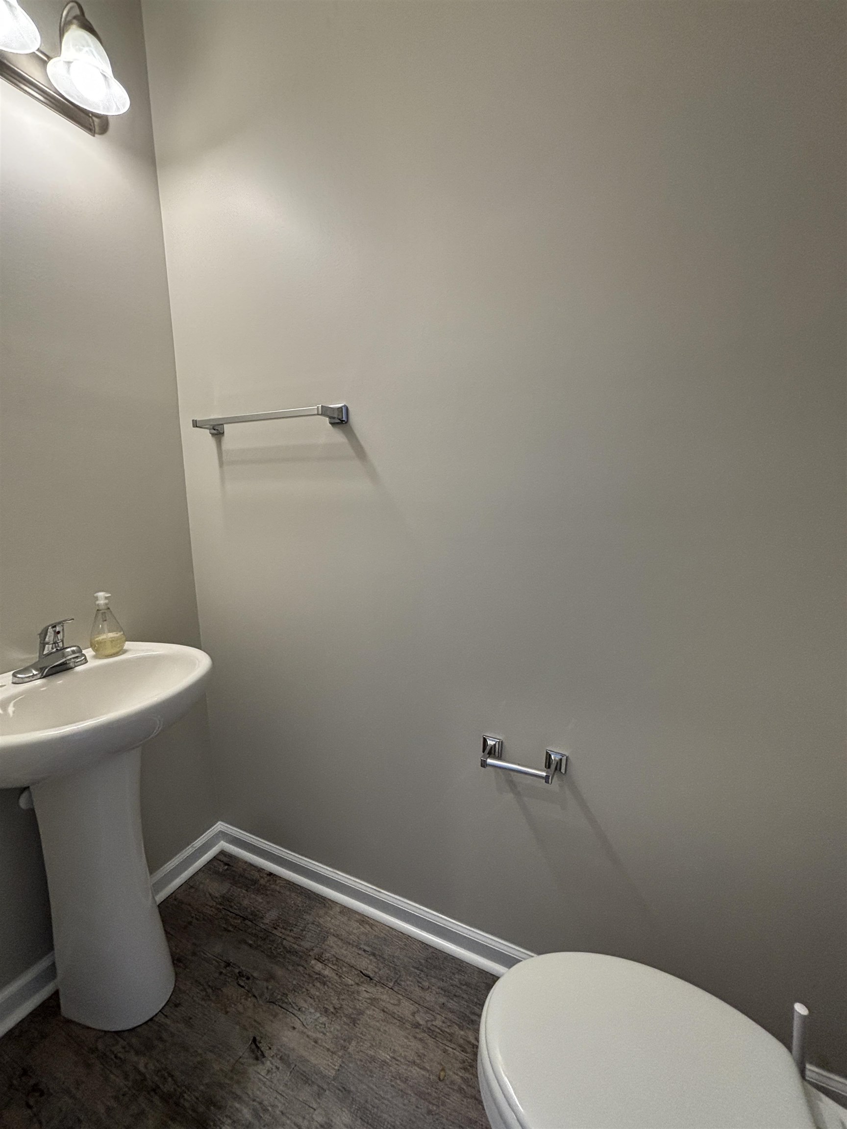 227 Leste Road Myrtle Beach, SC 29588 - Photo 16 of 33 Bathroom with toilet and dark wood-style flooring