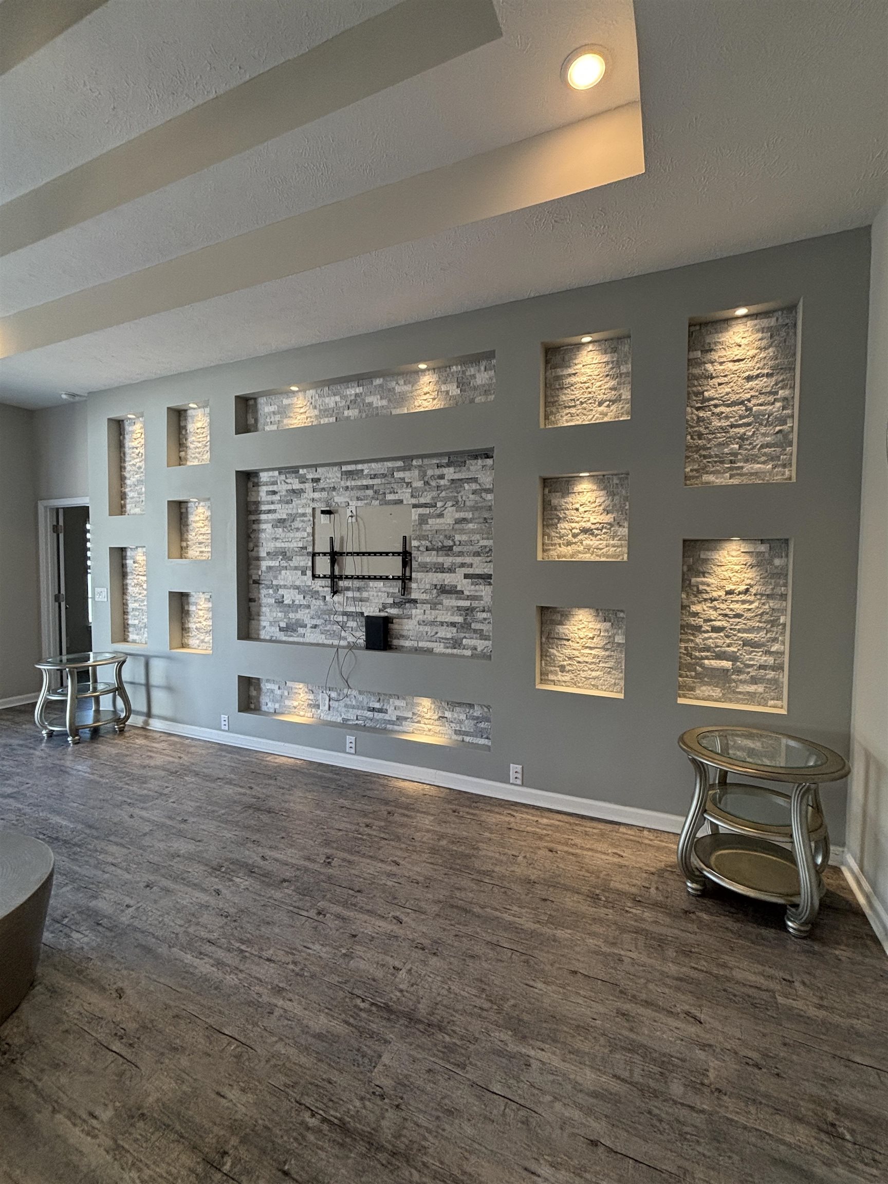 227 Leste Road Myrtle Beach, SC 29588 - Photo 25 of 33 Bar with a textured ceiling, a raised ceiling, dark wood finished floors, and recessed lighting