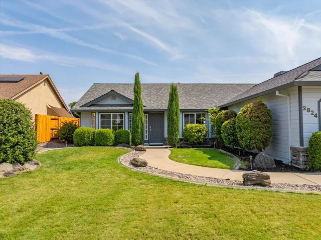 a view of a back yard of the house