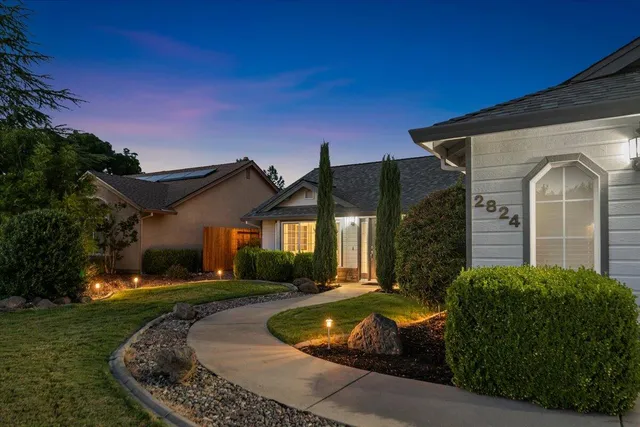 a bathroom with a sink double vanity and a mirror