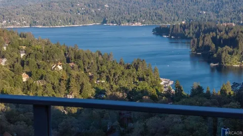 a view of a lake from a balcony